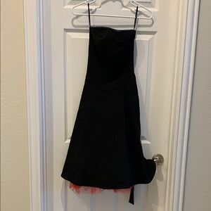 Elegant Black Dress with Pink Accents